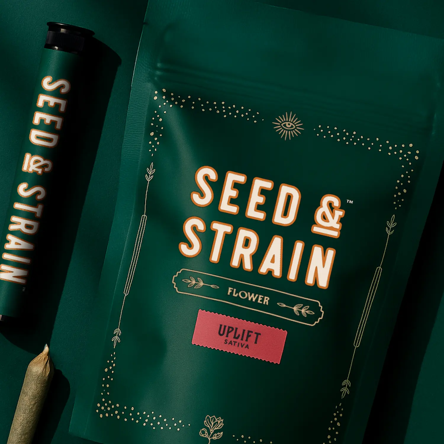 Dark green Seed & Strain cannabis packaging with a pre-roll tube and joint on a green background. The bag reads “Seed & Strain Flower – Uplift Sativa” in orange and white lettering.